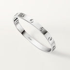 Pulsera LOVE cierre con tornillo <br> Oro Blanco